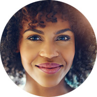 Woman smiling after cornea treatment