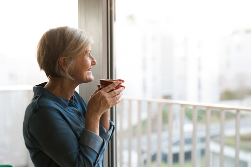 Woman with Cataracts looking outside