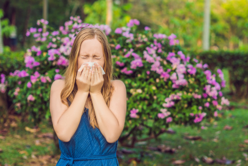 Woman suffering from allergies after LASIK