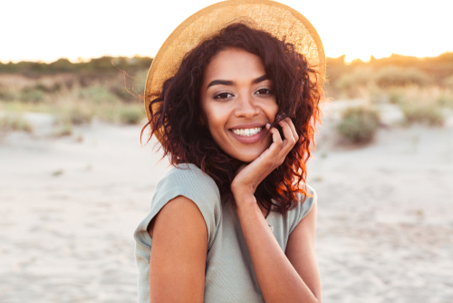 Woman smiling on a beach