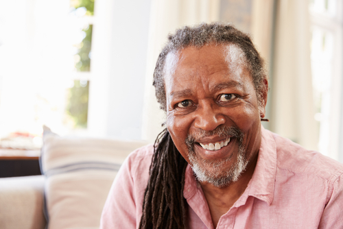 Older man smiling after cataract surgery